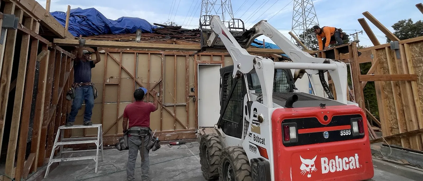 Construction crew working on residential framing