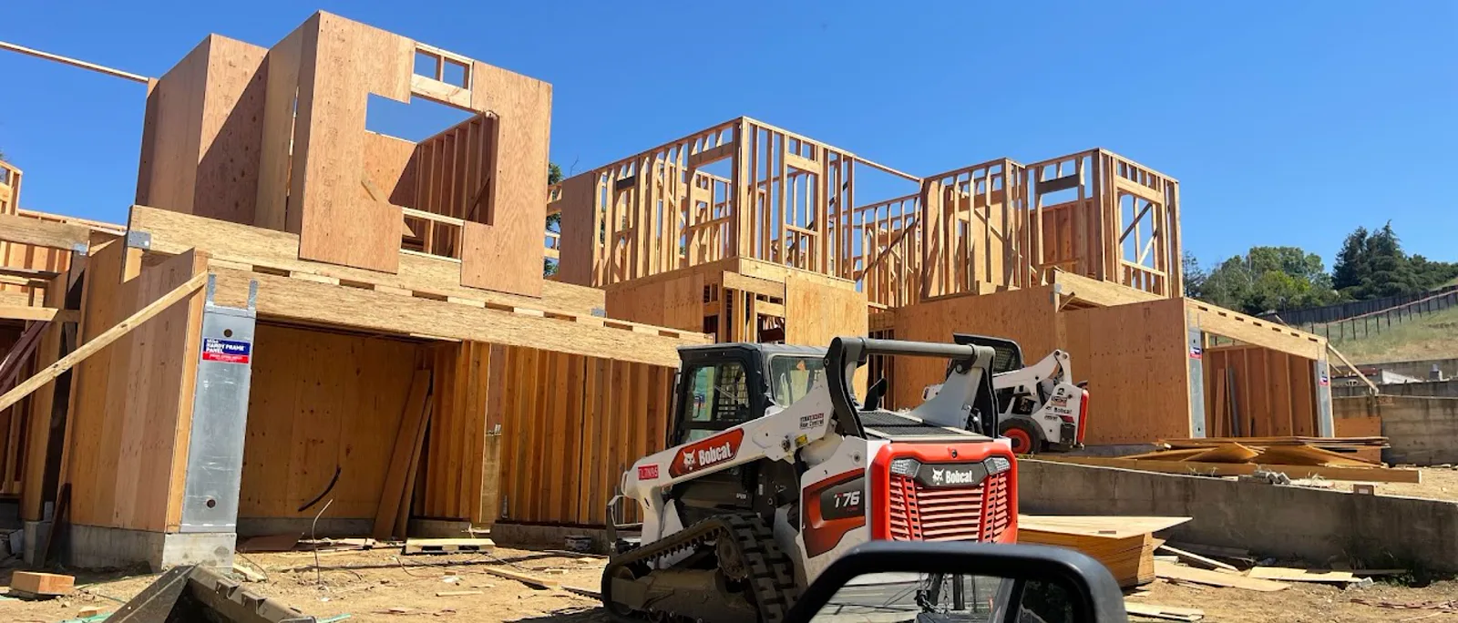 Residential site preparation with construction equipment